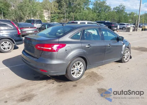 2016 Ford Focus Se z USA, uszkodzony, nr VIN 1FADP3F21GL334804